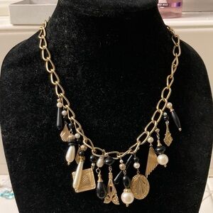 Avon Gold and Black Charm Necklace